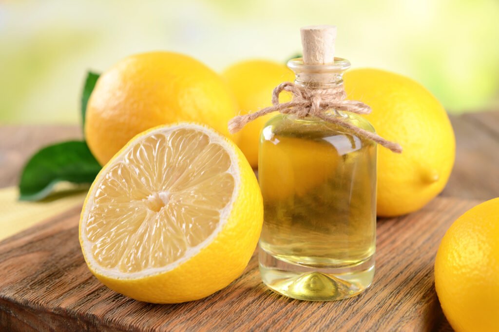 lemon oil on table on light background